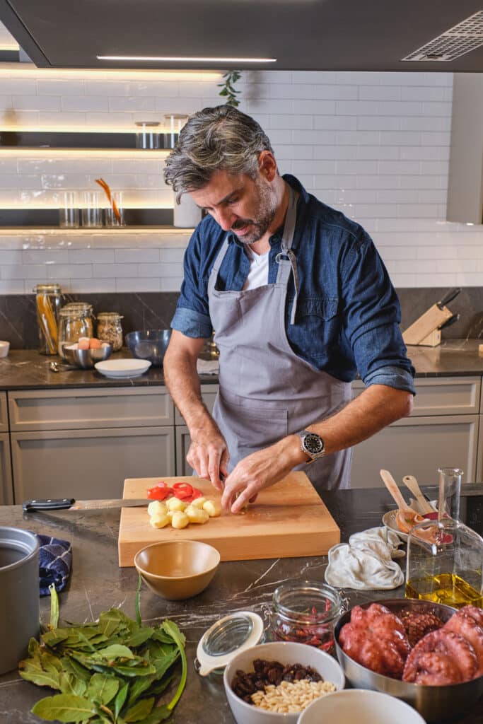 mature man cooking in kitchen 2026 01 09 09 38 05 utc 1